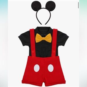 6-12 months Mickey Mouse outfit. New in packaging. Perfect for a trip to Disney!